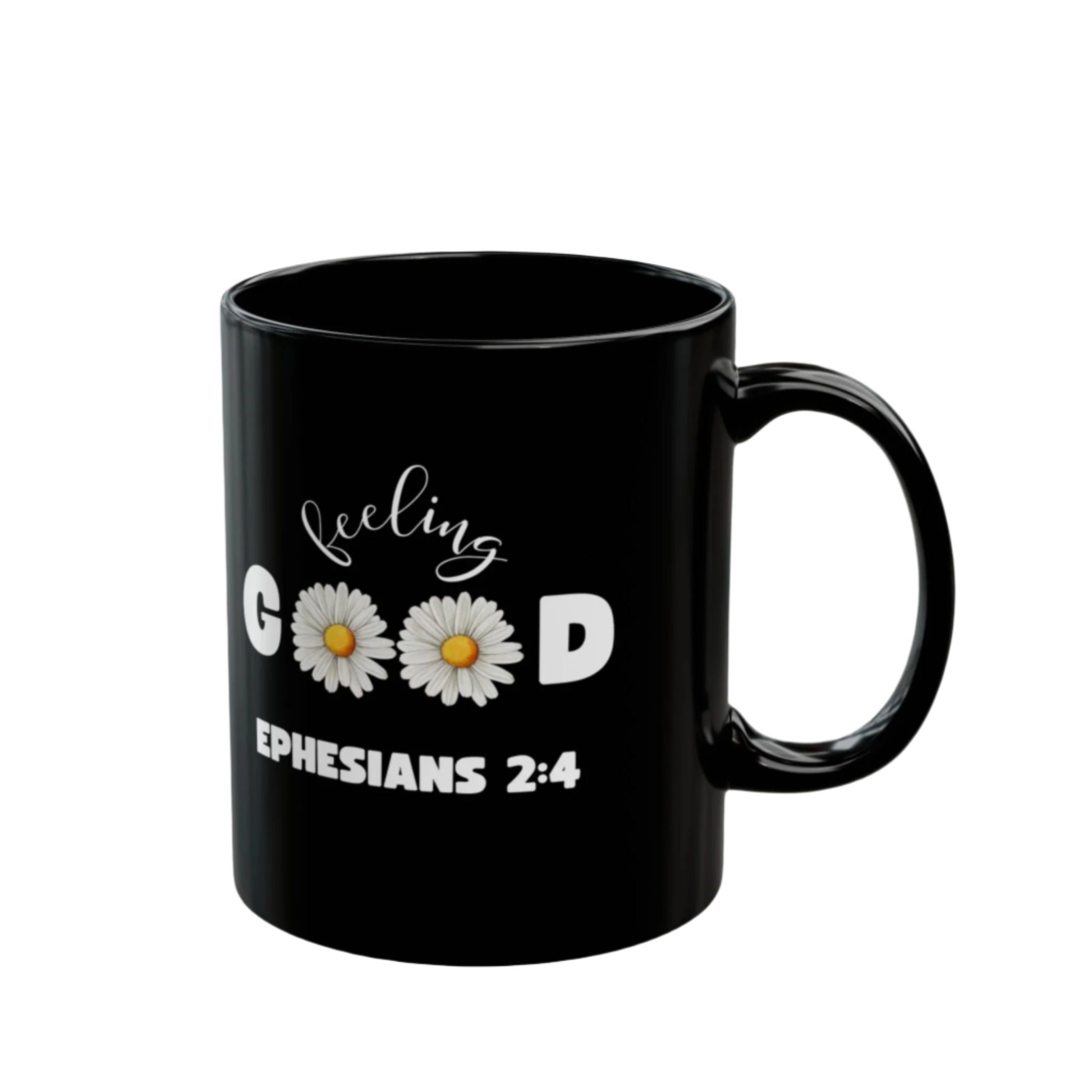Black mug with 'feeling good Ephesians 2:4' text and daisy graphics on a white background