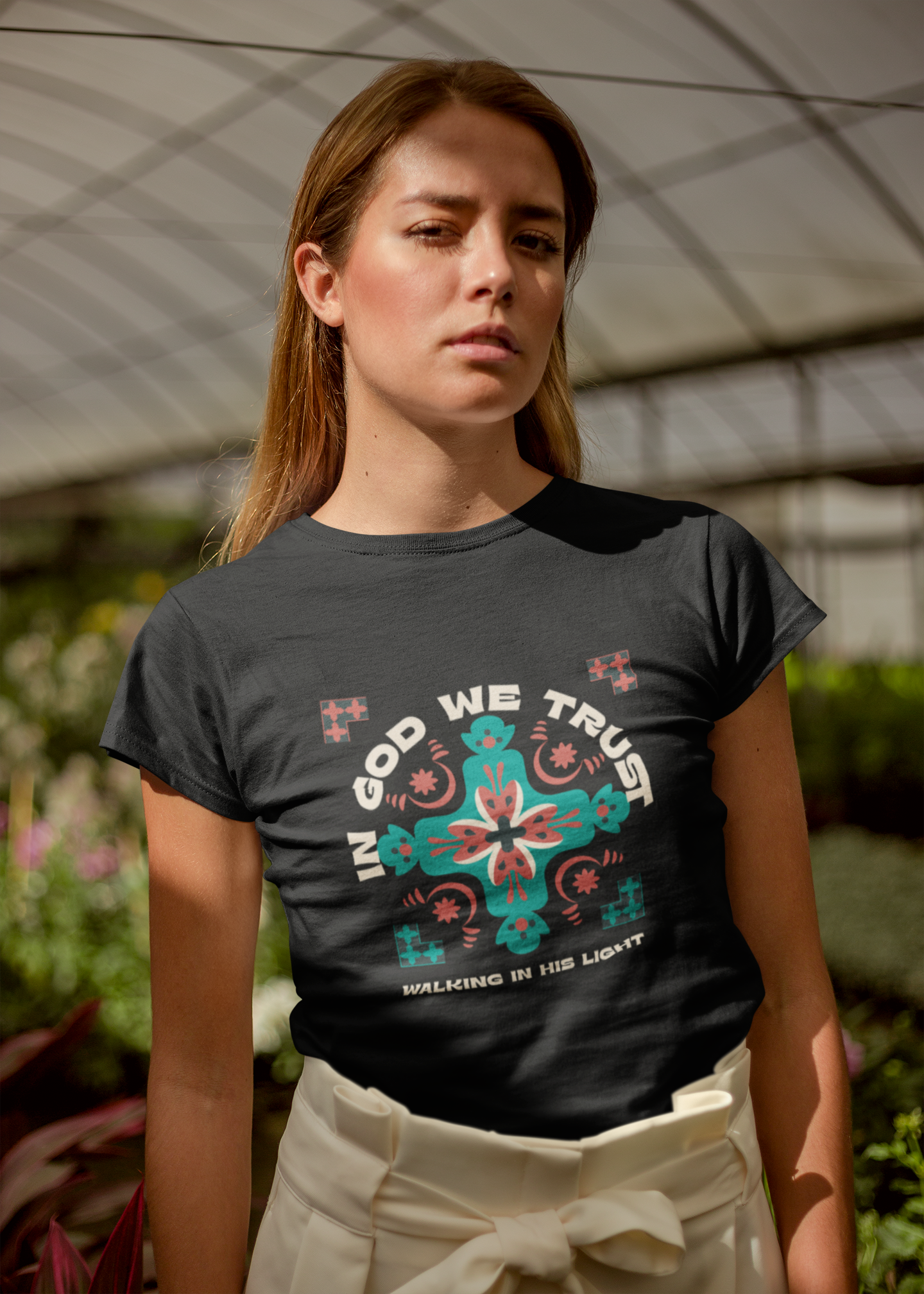“Black t-shirt with ‘In God We Trust’ and colorful cross graphic”

“Christian unisex tee with vibrant faith cross design”

“Religious t-shirt featuring ‘Walking in His Light’ phrase”

“Faith-based streetwear shirt with cross and scripture”

“Christian gift t-shirt with bold typography and cross artwork”

