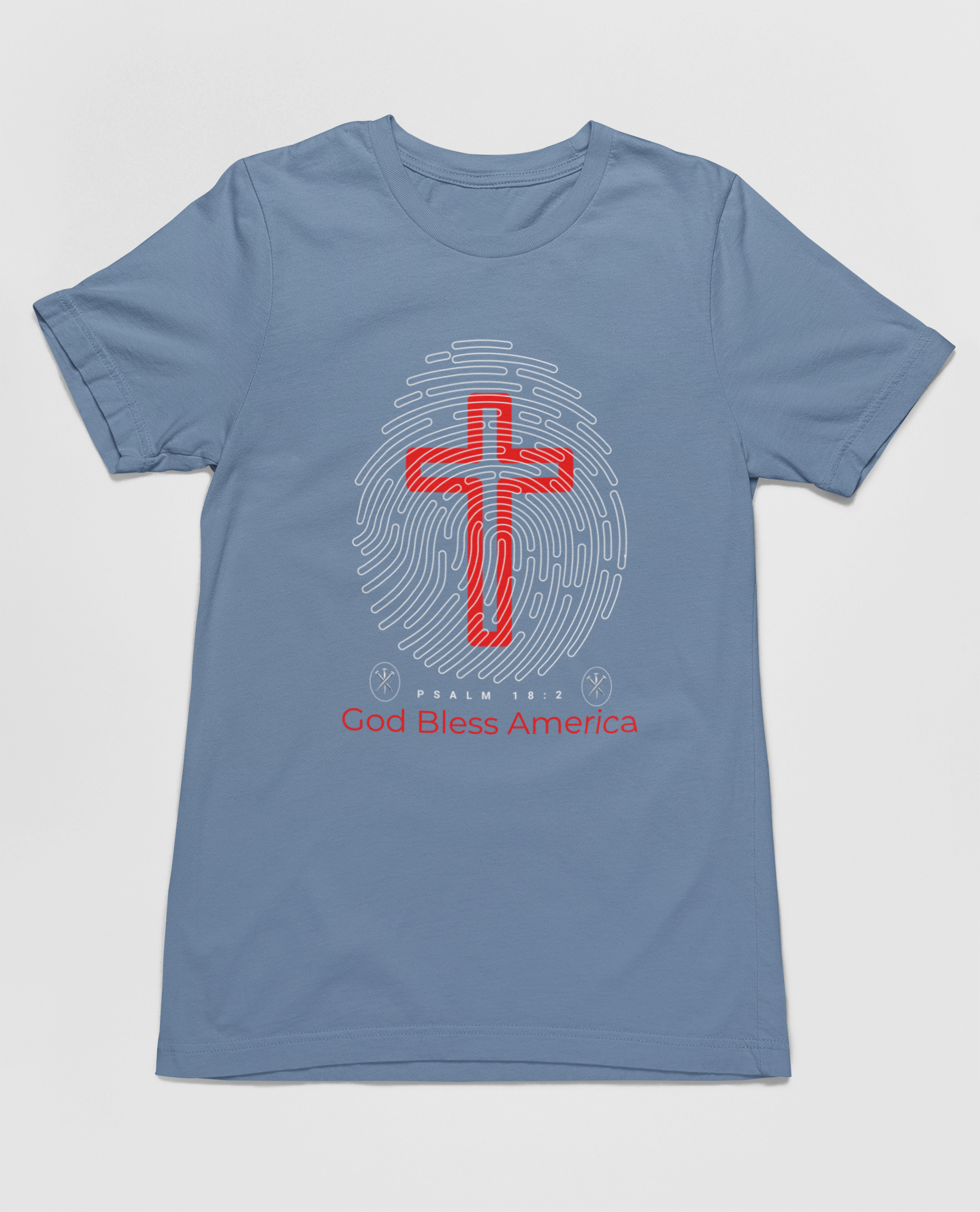 "God Bless America t-shirt with fingerprint and red cross design."
"Christian patriotic t-shirt featuring Psalm 18:2 scripture."
"Stylish and comfortable faith-based shirt for all occasions."
"Red cross design on a light blue Christian t-shirt."
"Patriotic and spiritual apparel with unique fingerprint graphic."



