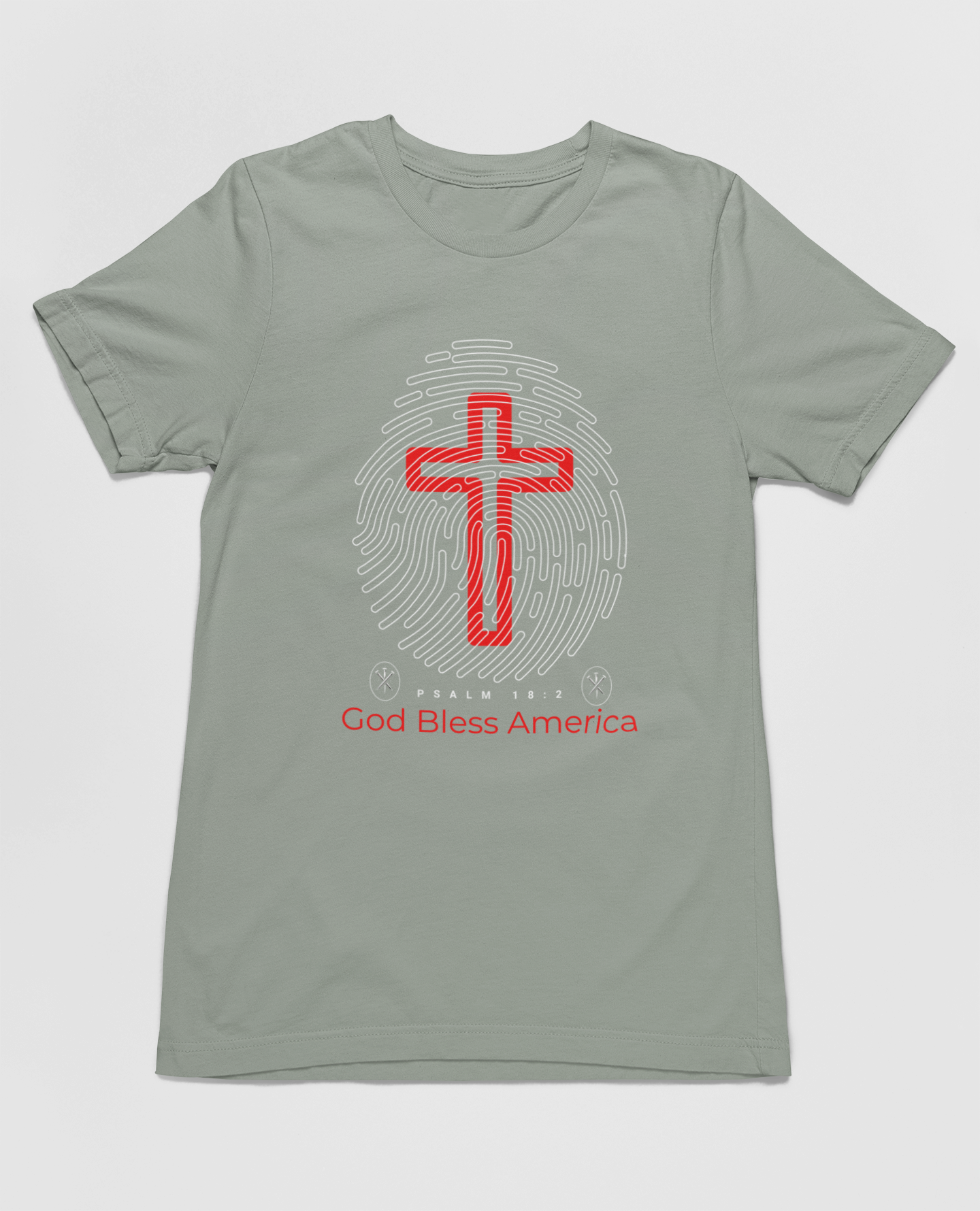 "God Bless America t-shirt with fingerprint and red cross design."
"Christian patriotic t-shirt featuring Psalm 18:2 scripture."
"Stylish and comfortable faith-based shirt for all occasions."
"Red cross design on a light blue Christian t-shirt."
"Patriotic and spiritual apparel with unique fingerprint graphic."