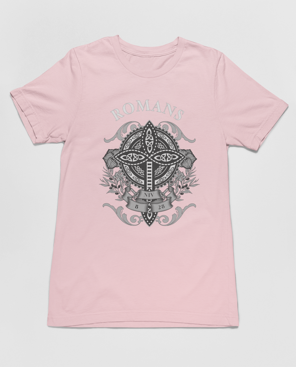 Christian Romans 8:28 Faith T-Shirt featuring the inspiring Bible verse "All Things Work Together for Good," with a cross-centered graphic and floral accents.