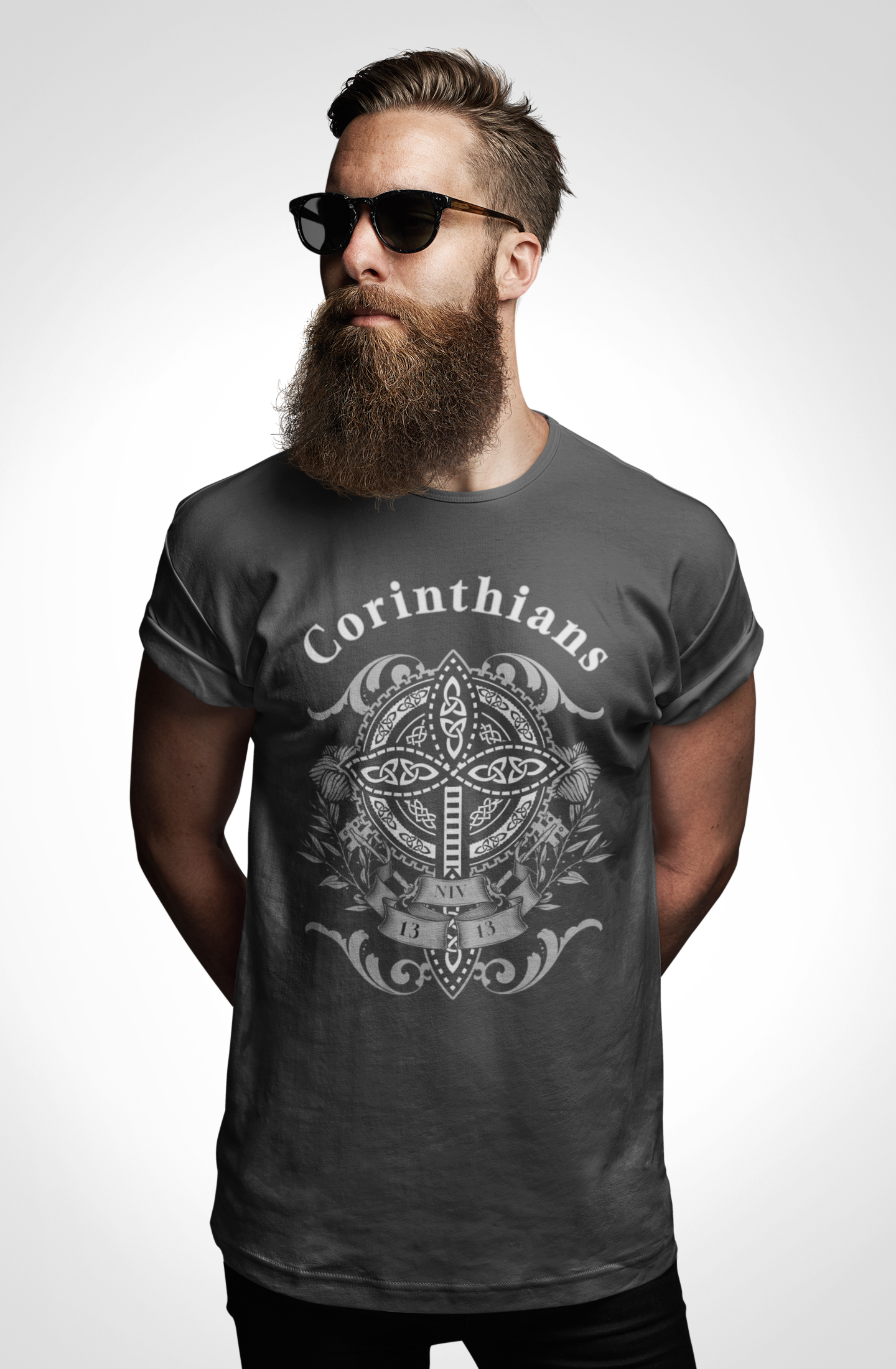Man wearing a dark gray t-shirt with 'Corinthians' design on a white background